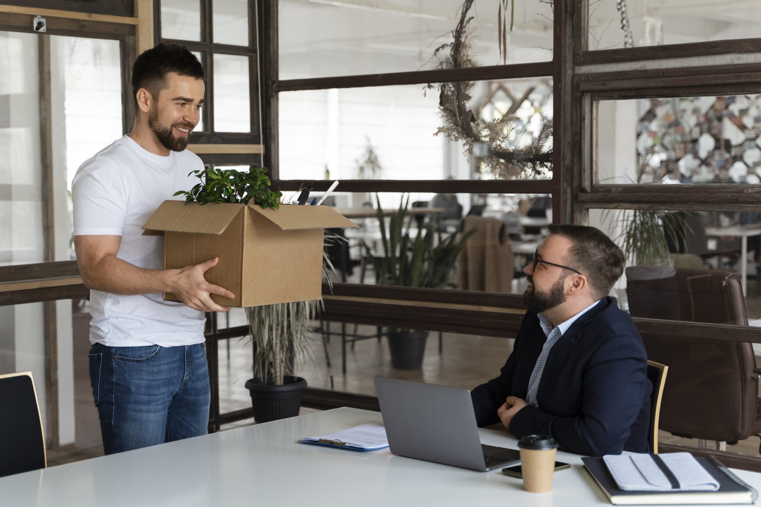 person presenting their job resignation scaled 1