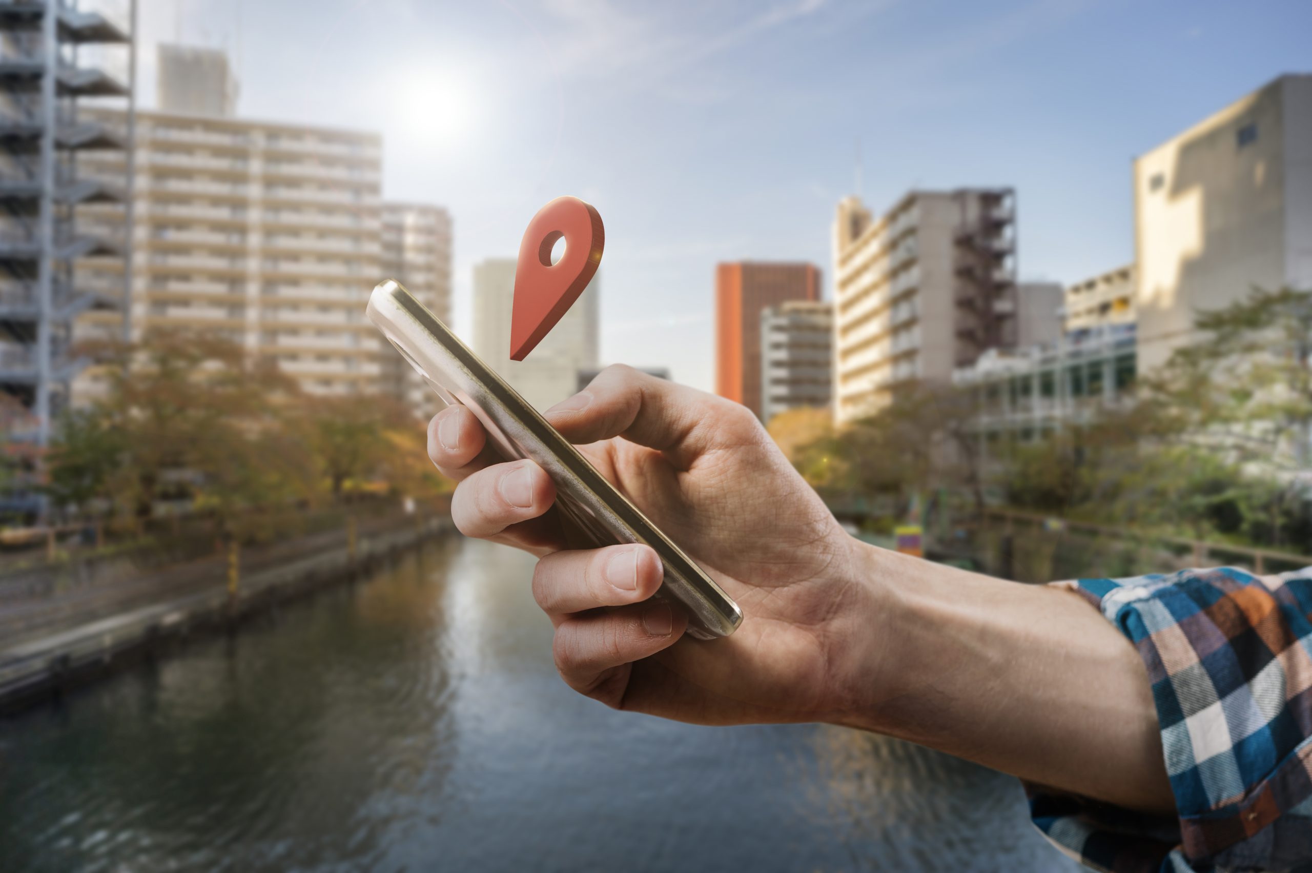 side view hand holding smartphone scaled 1